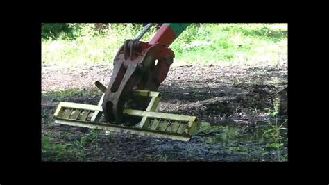 how to make a grading blade for a mini excavator|Homemade grading bar for mini excavator grapple attachment.